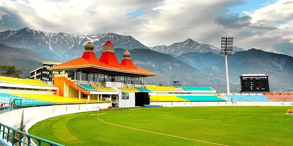 colorful umbrella on the seats of Dharamshala himachal cricket stadium  Stock Photo  Alamy
